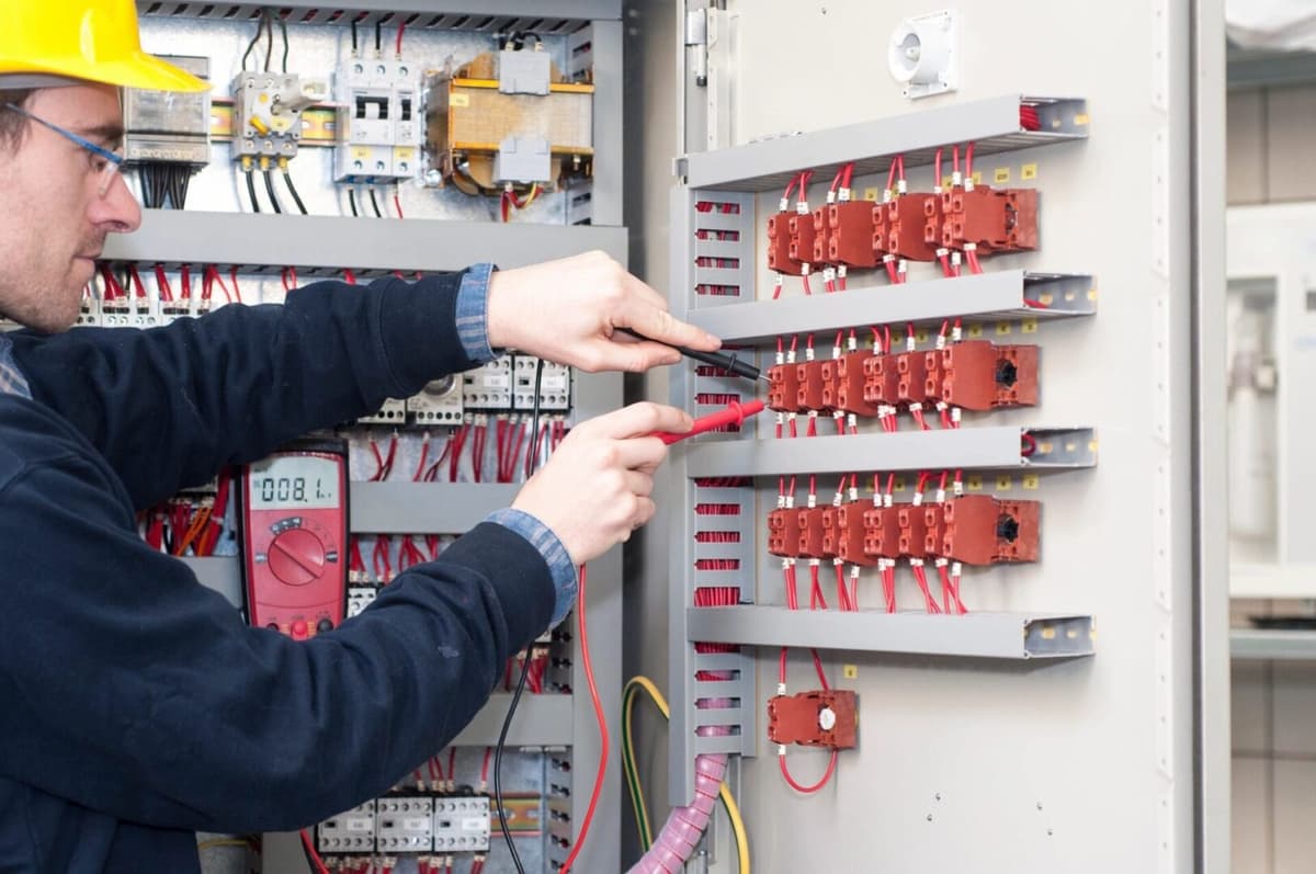 Mito Contracting Group team working on electrical systems